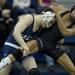 Saline Nate O'Sullivan wrestles Pioneer Robert Freter on Wednesday, Feb. 6. Daniel Brenner I AnnArbor.com